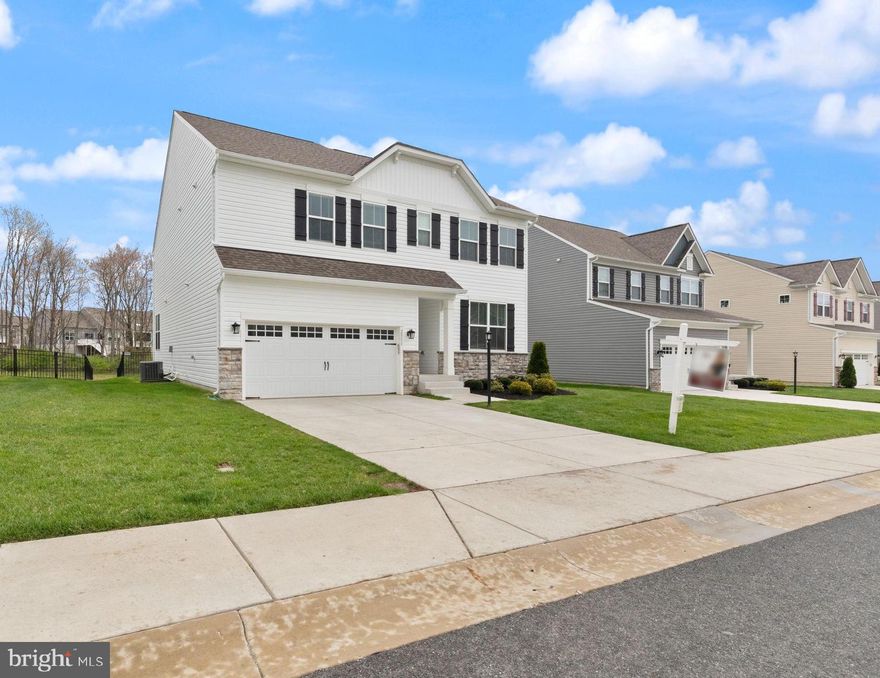 BETTER THAN BRAND NEW, already built and ready for move-in! Don't miss this practically new and  true 4 bedroom and possible 5th bedroom in lower level  home in Fallston! This one is so well done with a great open concept floorplan and neutral paint throughout!  Awesome location and gated community where the HOA does your lawn, shovels and plows the snow right up to your door, pays for your trash removal and takes care of weeding and mulching your flower beds as well as pruning the bushes around your house.  The Chef's kitchen with a huge kitchen island, white cabinets, gas cooktop with hood, walk in pantry and quartz counters.  The first floor has a flex room that can be a formal living room, office, playroom or formal dining room.   The open concept family room, breakfast nook, and kitchen are perfect for formal or informal gatherings with the gas fireplace adds warmth with luxury vinyl flooring. Upstairs you will find four bedrooms. The primary bedroom has a 20 foot long walk-in closet, but the other three bedrooms have walk-ins as well. There is a buddy bath between two bedrooms and the 4th bedroom with its own private bath. The laundry room is conveniently located on the bedroom level.  Basement has multiple rooms with a possible 5th bedroom, rec room, office nook, and play area. Rough in is ready for a bathroom.  Backyard backs to the community walking trail and is fully fenced with a wrought iron fence. Nothing to worry about here!  The centrally located community is close to I-95, downtown Bel Air, and all the local Blue Ribbon Schools.