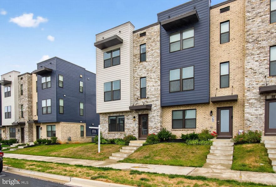 Modern Townhome in Renn Quarter, walkable to Downtown Frederick! Stylish 3-bedroom, 3.5-bath townhome located in the highly desirable Renn Quarter community built by D.R. Horton. Built in 2022, this home offers a bright, open layout with 9-foot ceilings, luxury plank flooring throughout, hardwood stairs, and a spacious kitchen featuring stainless steel appliances and quartz countertops. Step out onto the deck off the kitchen, perfect for morning coffee or evening relaxation, with peaceful views of lush green space that feel like a private retreat. The upper-level primary suite includes a large walk-in closet and a beautifully appointed en-suite bath. The versatile lower level space is perfect for a home office or guest room, complete with a full bathroom. Renn Quarter is one of Frederick’s most exciting new communities, offering future amenities such as parks, trails, open green spaces, and the planned Carroll Creek Walkway Extension. Located just minutes from Historic Downtown Frederick, you will enjoy walkability to shops, restaurants, and entertainment, plus easy access to commuter routes. Come and say hello to your new home!!