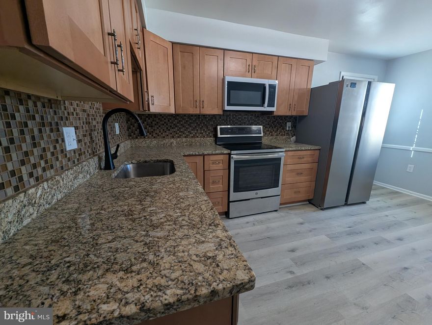 This home has just been beautifully remodeled and is ready for you to move right in and enjoy, featuring upgrades throughout that bring a fresh, modern feel to every space.  Check out the roof, deck, patio, bathrooms, kitchen, flooring.

Welcome home to this beautifully upgraded 4-bedroom, 2-bath remodeled raised rancher offering the perfect blend of space, comfort, and modern touches. From the moment you arrive, you’ll notice the inviting presence, generous driveway, and large yard—ideal for gatherings, play, or simply enjoying your own outdoor space.

Inside, the home opens to a warm and functional layout with multiple living areas designed for everyday living and entertaining. The updated kitchen and upgraded bathrooms create a clean, inviting atmosphere, while the overall flow makes it easy to picture life here—from quiet mornings to hosting family and friends.

Each bedroom offers comfortable space and flexibility, whether for family, guests, or a home office. The combination of upgrades and layout delivers true move-in-ready convenience.

Conveniently located near shopping, commuter routes, and everyday essentials, this home offers both lifestyle and accessibility in an established neighborhood.

This one is great in photos, but better in person.  The room sizes and the yard are wonderful! —schedule your showing today.