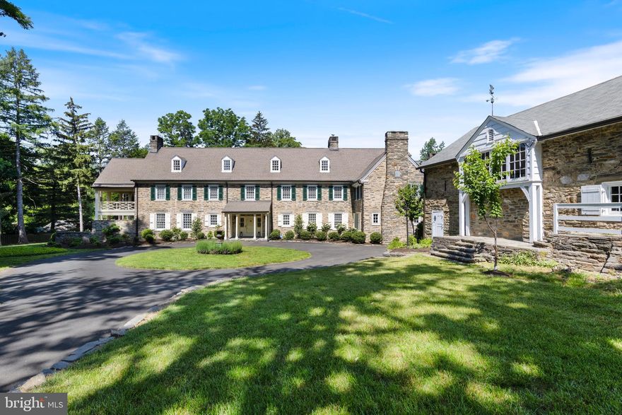 Designed and built by renowned architect John Graham, JR in 1915,“The Orchard” is a great American house. This classic 8,645 sqft Colonial Revival estate was built in 1916 for the Wetherill family on almost 2 acres. The pedigree of this architectural masterpiece has been documented in Town & Country magazine's June  1919 edition and the book “Important American Houses” by Keefe in 1922.Originally built as a country estate,the first floor consists of grand entrance hall, formal living room, dining room, library, family room, and kitchen; all tied together by a light-filled 30'x6' gallery. The dining room features its original antique Zuber mural, “Views of North America,” painstakingly restored to its original splendor. This mural predates the exact copy that First Lady Jackie Kennedy had installed in the Diplomatic Room of the White House in 1961.  Moving towards the chef inspired kitchen, notice 48” Viking Range & ample storage. Ascending the grand staircase to find the primary suite, featuring an updated bath, his & her dressing rooms/closets, fireplace, and lovely summer sleeping porch. Three more spacious bedrooms with fireplaces and private baths complete the second floor. The tfloor is comprised of a bedroom suite, a vaulted billiard room, and a large walk-in cedar closet converted to an additional recreational room. A 2-bedroom  apartment, with its own entrance, is the perfect space for guests, in-laws, or an au-pair suite or professional office. The converted barn includes a 2-car garage and exercise/dance studio which could be perfect for your home office. This home is conveniently located within walking distance to Chestnut Hill also known as Philadelphia Garden District, public transportation, restaurants, shops and an easy commute to Center City, PHL Airport and much more. "The Orchard" is truly a magnificent estate and is waiting to tell its next story.