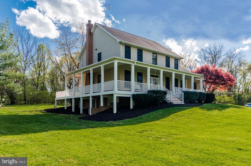 Gorgeous property! Stunning wrap around porch  for views of entire yard.  Brand new light colored hardwood floors to reflect even more light into a bright, open, airy and grand home that was made for entertaining. Enjoy small gatherings or enormous parties with the large yard and grand porches. This property can handle it all!  Comes with 2 master suites on the second level.  A fully finished basement with storage/utility area that is crisp and clean. Basement also has a full bath and plenty of space for extra guests!