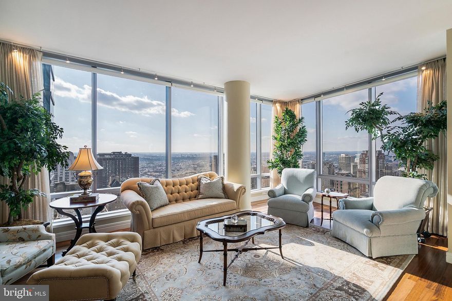 Enjoy breathtaking panoramic skyline views from this three bedroom, three and a half bath residence in the sky!