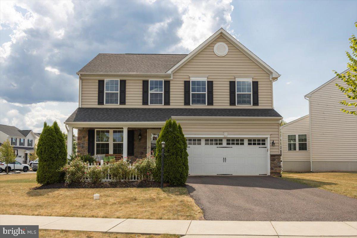Come take a look at this beautiful home!   Sellers are motivated.  Wonderful memories to be made in this lovely home in the desirable Hanover Woods neighborhood!  Welcome to 125 Marisa Ln, the 2nd largest model in the development on a spacious corner lot.   You’ll appreciate the bright and airy open concept, the flexible room spaces, and the amazing in-law/au pair suite in the lower level 
As you walk up to the home, you’ll notice the spacious driveway and 2 car garage but the white picket fence,  patio and covered porch really draw you in.   Once inside, the home warmly welcomes you with the open foyer, wood floors and high ceilings.  The living room and dining room are open as well which lends them to multiple uses and furniture layouts. The cook in the family will appreciate the kitchen with granite countertops, double sink, stainless steel appliances, butler’s pantry, recessed lighting, and a gourmet island large enough to seat the family.  The kitchen is open to both the family room on one side and the sun room on the other.  The family room with gas fireplace, ceiling fan, and recessed lights offers plenty of space for relaxing, or watching your favorite shows. The sun room, has endless possibilities for use and it opens with sliders to the Trex deck, and large yard.  This home also offers fabulous outdoor space!   From the front porch and patio, to the Trex deck, additional patio with fire pit,  and abundant yard space, there is plenty of room for social gatherings plus all of your toys!
Need additional living space?  The basement is a sunny in-law or au pair suite complete with an expansive living room, 1 bedroom, walk in closet, full bath, and laundry room. This suite is easily accessible from the garage entrance to the home. The 2nd floor of this wonderful home contains a luxurious primary suite with 2 walk-in closets, ceiling fan, bathroom with double sinks, soaking tub and tile shower. 3 additional spacious bedrooms and a convenient laundry room complete this floor.  This lovely home in a great neighborhood has so much to offer.  Come see it before it’s gone!