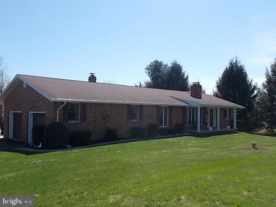 GORGEOUS SETTING...ALL BRICK HOME BOASTS MANY RENOVATIONS* NEW CARPETING, FRESH PAINTING, NEW APPLIANCES,  3000 SQ FT OF LIVING SPACE*ENTERTAINERS DELIGHT*HUGE FAMILY ROOM W/FIREPLACE* THE 2 CAR GARAGE HAS A WOODSTOVE FOR HEAT* DETACHED GARAGE IS A GREAT "MAN CAVE" PLUS A FULL SHED & A UTILITY SHED*IN-GROUND POOL W/POOL HOUSE*SPECTACULAR VIEWS OF ROLLING COUNTRYSIDE*MID ATLANTIC FRENCH DRAIN LIFE TIME TRANSFERRABLE WARRANTY*