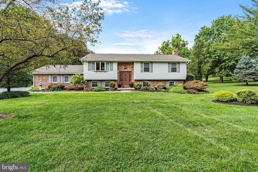 Newly Listed Spacious Split Level Property With 4 Bedrooms, 2.5 Bathrooms & 2 Car Garage. Walk In & Be Greeted By Tons of Natural Light, Main Level With Newly Installed Bamboo Flooring, Separate Dining Room, Kitchen With Granite Counter Top, Electric Stove, Built-In Microwave, & Tons of Cabinet Space! The Spacious Bedrooms On The Main Offers Ceiling Fans, Master Bedroom &  Window Treatments. The Lower Level Is Perfect For Entertaining With Its Large Family Room With Pellet Stove, Walk-out Access To Rear Patio & Spare 4th Bedroom For Guests! Bonus Features Includes 2-Car Garage, Multi-Car Driveway, Spacious Rear Yard, Rear Deck & Much More!! Schedule A Private Tour Today!