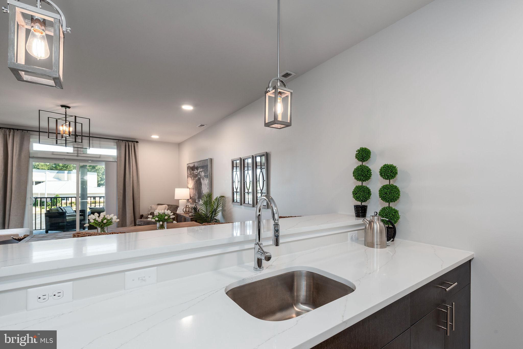 FLATS AT COASTAL STATION - Residential