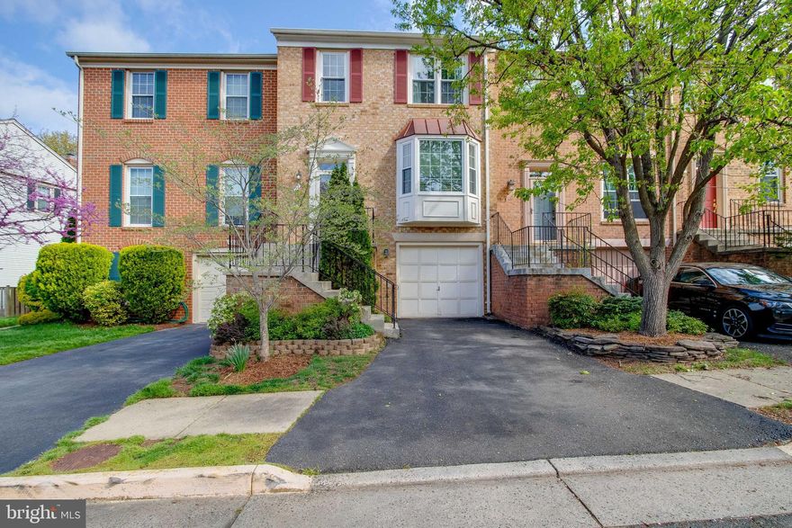 Popular Fair Ridge  3 Level, Brick front, townhome with garage with no thru street!   Living room with new Bay window and  separate  formal Dining Room. Hardwoods on main level, Kitchen updated with 42 inch cabinetry with granite counters and stainless Appliances with Gas cooking.   Upstairs is a Large Primary bedroom with Cathedral ceiling and ensuite private bath with walk in closet.  2 additional Bedrooms upstairs, all with Cathedral ceilings!  Upper Level Main Bath upgraded.  Lower level has walk out with new sliding door and windows plus cozy fireplace!  Patio and fence have just been power washed makes for a relaxing private area.  New roof in 2020,  New Sliding door, basement window- 2021, Storm door replaced along with some new windows including skylight!  New garage door opener, new paint, HVAC fully serviced 2019, The Ring Doorbell and Nest thermometer convey! Walking distance to 6 different shopping areas/ mall with restaurants,  and grocery stores including Whole Foods! Easy commute to I-66, Rt 50, and Fairfax County Parkway!  Plenty of parking across from unit!