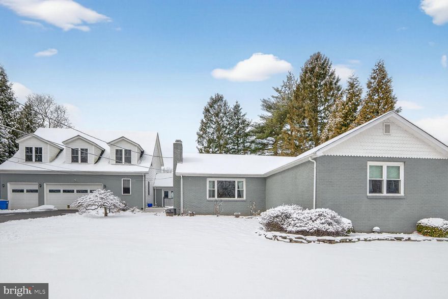 Welcome to a truly rare opportunity offering 4,600+ square feet of ABOVE GRADE living space on .60-acre lot with front porch views of Patapsco Valley State Park -a setting that feels like a retreat every single day. Extensively renovated in 2020, this homes offers a combination of main level living and upper level addition provides seller a possible separate living space for the family member who would like to live independently but still within the same home.

The expansive first floor features four spacious bedrooms, two full baths, and a half bath. The primary suite boasts a stunning en-suite bath complete with a walk-in shower. Designed for both everyday living and entertaining, the main level also offers a formal dining room, separate living room, and an oversized family room, with soaring vaulted ceilings, off kitchen.  A large private office, convenient first-floor laundry, and an enormous bonus room — perfect for a recreation room, pool table space, or home theater!

Upstairs, flexibility abounds. The second level is ideal for multi-generational living, an in-law suite, or even potential rental income. It includes two additional bedrooms (one with en-suite bath), a full kitchen, washer and dryer, and a half bath -providing comfort, privacy, and independence all under one roof.
If that’s not enough space, the unfinished basement offers an additional 1,325 square feet ready for your imagination -gym, media room, workshop, or expanded living area. Professionally waterproofed with JES & transferable warranty to buyer.  Easy access to I-70, this home is just minutes from the charm of Town of Sykesville. No HOA. Public water and sewer. Town trash collection included.

Looking for a move that doesn’t need updating? This home is yours! Refer to uploaded documents for dates of systems/appliances/and more! Space, updates, privacy, and views; this is one you truly must see.