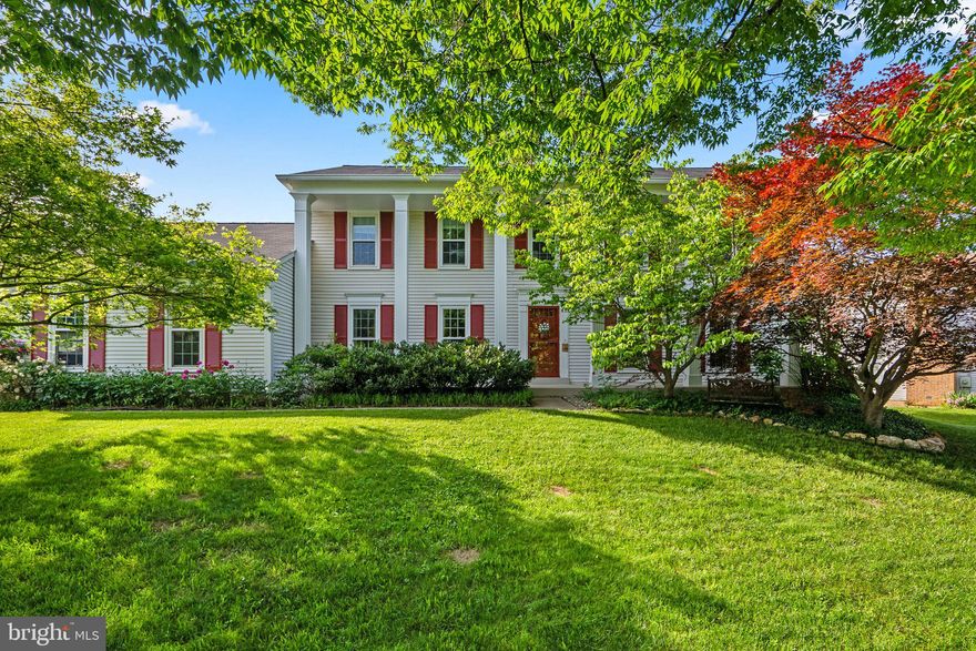 Hallowell Madison  Model  Pulte Built Colonial in Pristine condition and shows outstanding and faces open green area with pond. . Provides a great look from your front door. The main level has gorgeous wide plank Brazilian tiger hardwood floors . These floors look outstanding. The main level office features tastefully done oak built ins. There is beautiful updated  island kitchen with custom birch cabs , granite counters and backsplash , GE Appliances , double pantry , plus beautiful Brazilian wood floors. The updated  island kitchen opens directly to the family room with an attractive wood burning brick fireplace. This spacious home at 2758 sq.ft. above grade offers a formal dining room with bay window and a  large living room. Both have crown molding and chair rail. There is also a upgraded main level laundry / mud room . The laundry room has  been upgraded with tile flooring , custom cabinets, and added window. The upper level offers 4 generous bedrooms. The primary suite offers a beautiful updated primary bath-with granite counter double vanity , walk in shower and soaking tub ,plus 2 walk in closets... There is a custom deck with 550 gallon hot tub overlooking the landscaped  back yard. Replacement thermo pane windows have installed. The lower level is finished with a large rec room and a den or possible 5th bedroom plus a full bath and wet bar... The outside features beautiful landscaping .Fantastic location just minutes to Olney Town Center .The community offers pool, tennis , tot lots , and more.