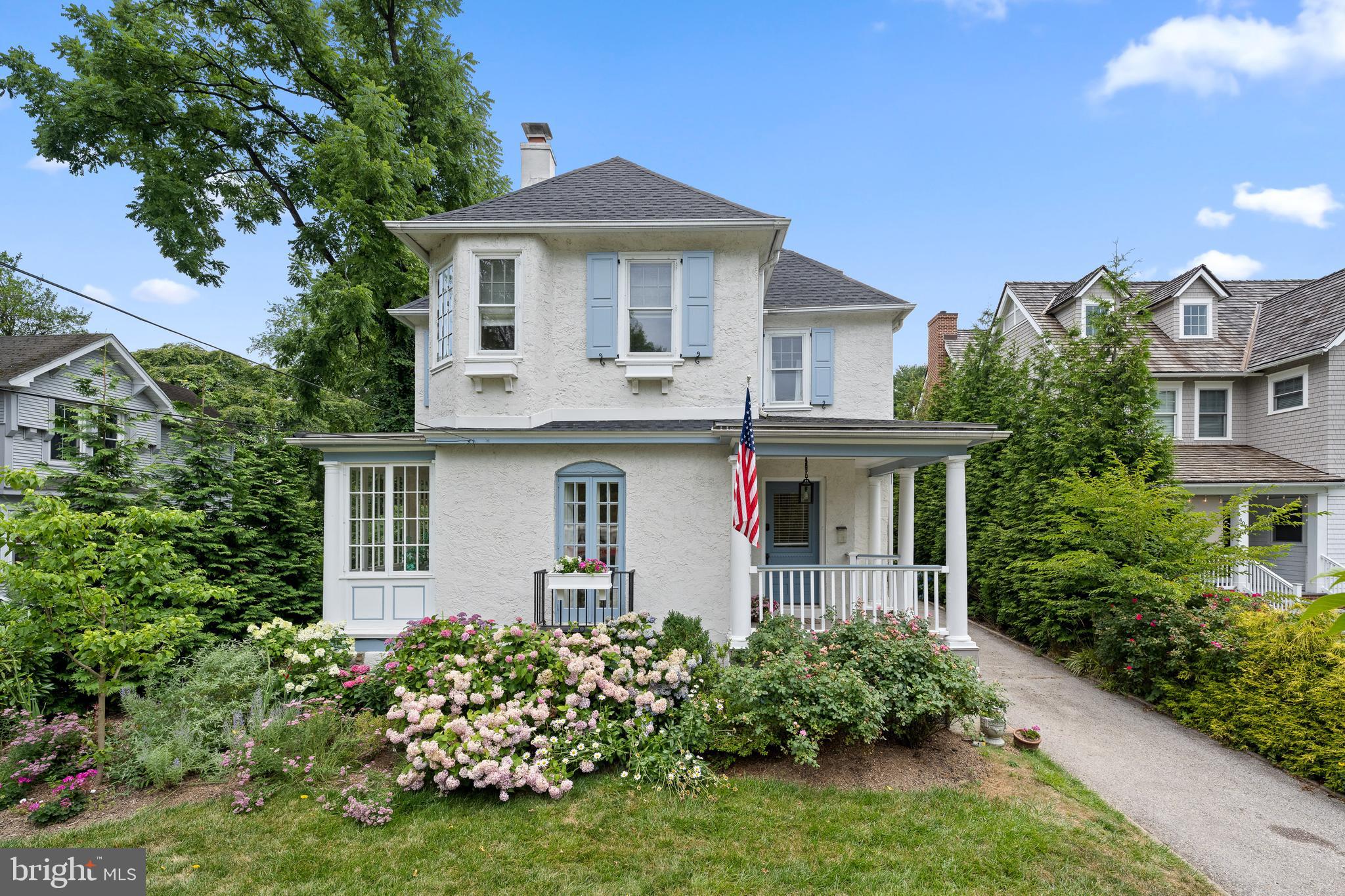 A short walk from charming downtown Wayne, this beautifully appointed
1895 French colonial has been completely renovated by the current owners, who have
incorporated many modern features and amenities while honoring the home’s classic and
historic characteristics. The repainted and updated exterior, complete with new roof and landscaping,
oozes curb appeal, and the cozy front porch offers a delightful entry point. Inside,
the light-filled main level features refinished hardwood floors throughout, recessed
lighting, distinctive moldings and (new) neutral paint. The foyer spills into a warm
and welcoming living room with ten-foot ceilings, a gas fireplace and French doors
that open to a Juliet balcony. Just beyond you’ll find a superbly renovated chef’s
kitchen with all-white cabinetry, new appliances, farmhouse sink, quartz
countertops, custom range hood and peninsula seating. The kitchen overlooks a
dining room with elegant wainscotting and convenient access to both the rear patio
and a side sunroom with restored windows. The picture perfect sunroom boast beadboard ceiling and a bank of casement windows for a quintessential private nook. Behind the kitchen even more space
awaits, including a family room with raised ceilings and bay window, updated
powder room with classic built in cabinet and wainscotting, a laundry closet and door leading to the side driveway. Take the exquisitely preserved stairway—accented with original moldings and
flourishes—to the freshly painted second floor, where you’ll find refinished
hardwood floors throughout. A dedicated hallway separates the bright and airy
primary suite, complete with renovated ensuite full bath, walk-in closet, custom
plantation shutters and oversize laundry closet. This floor also contains three
secondary bedrooms that share a large, updated hallway bath with dual-sink marble
vanity. A short flight of stairs leads to the third floor, which the current owners
transformed into a bedroom suite with brand-new ensuite full bath. Outside, a
flagstone patio borders a fully fenced, nicely landscaped large backyard lined with
mature trees for privacy. Award-winning Radnor Township schools, this
walk-to-Wayne gem is central to many top restaurants and retail destinations, along
with playing fields, parks and playgrounds, train station and more! A truly special, one of a kind home!
