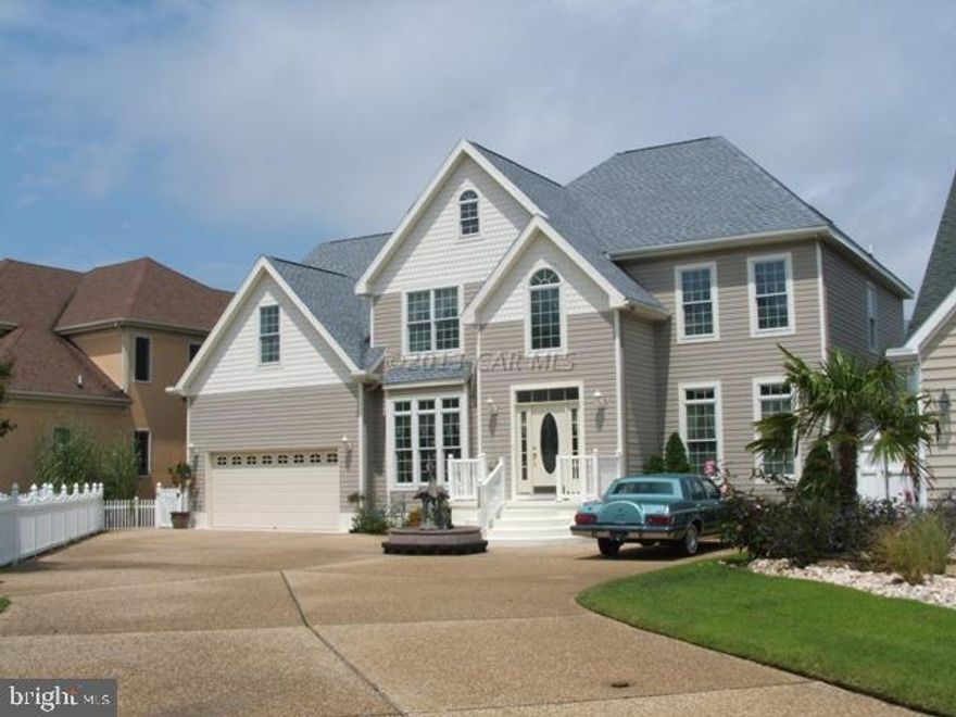 Major price reduction, Seller will consider all reasonable offers! This terrific home has it all. 5 bedrooms with private bathes, open family room with vaulted ceilings and gas fireplace. Oversized rear deck with sunset waterviews. Pre-appraised!