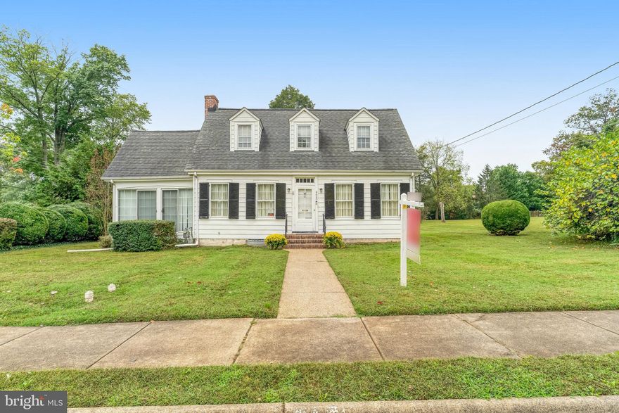 You will not want to miss this amazing opportunity in Historic Manassas. This 1935 home sits on almost a half-acre flat corner lot with separate stand alone 2 car garage. You will feel the warmth and charm as soon as you enter. Hardwood floors throughout. Main level features living room with wood burning fireplace, dining room, sun room, bedroom, full bath, half bath and kitchen. Kitchen features stainless steel appliances, white cabinets and granite counters. Upstairs you will find 2 bedrooms and an updated full bath. Enjoy the outdoors on concrete patio perfect for entertaining. Plenty of parking. Close to everything Historic Manassas has to offer. NO HOA. Sold AS IS. Come fall in love.
