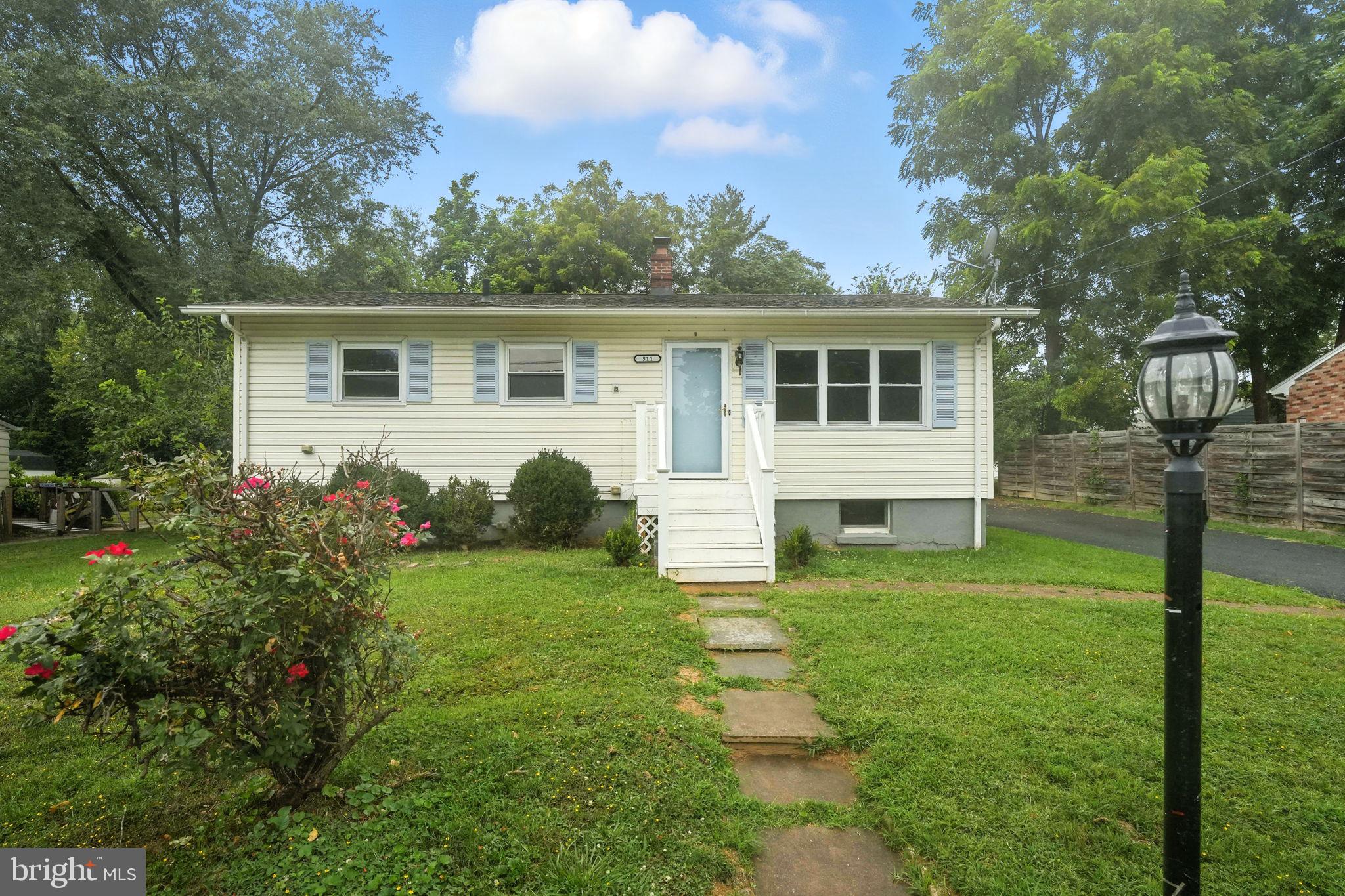Amazing opportunity in Purcellville! 3 bedroom, 2 bath home with detached garage/work shed on a large quiet lot. Offering a traditional floor plan and plenty of natural light, this home provides the ease and convenience of one-level living. The main level includes a traditional living room, eat-in kitchen, bonus sunroom, full bathroom, and 3 bedrooms. One bedroom has been converted to an oversized laundry room but can easily be moved downstairs if preferred. The lower level includes a large rec space with built-in shelving, 3 additional rooms, and a full bath. A fully-fenced backyard with patio and garage/work shed on .25 acres completes the home. Sold as-is. Convenient to downtown Purcellville, shopping, dining, and schools. Welcome Home!