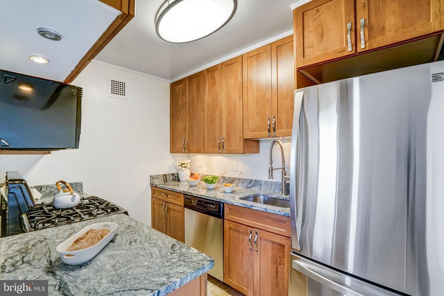 Picturesque corner unit midrise style 1-level condo in highly sought after North Arlington, 3-bedroom, 2 full baths, National Cathedral & Tree Views, deep interior window ledges throughout.
The kitchen’s generous cabinet, granite countertops, deep sink & gas range will stir the chef’s creative juices! The sundrenched parquet floors from the entry to the living and dining room offer a smooth flowing to your evening’s entertainment.
2 corner bedrooms awarded with plush carpet, enchanting tree views & abundant space for yoga or a writing nook. Primary retreat with ensuite is perfectly nestled to the rear, leaves you with a serene end to your day. Bedroom 3’s flexibility as a bedroom, home office/den, guestroom, music or game area, allow your imagination to envision this versatile space. Step out on the private balcony while you sip an espresso and gaze over your herb garden.
Newer convectors throughout, a renovated hall bath with Carrara Marble shower, black granite floors and glass enclosure. Verizon fios installed and tastefully updated primary bath.
Condo fees cover newly renovated rooftop common area featuring kitchen, island, windows with sweeping views, all utilities, parking, fitness center, on-site dedicated storage assigned by management, bike storage, laundry on each floor with additional laundry area showcasing oversized machines on the ground level next to the Engineers office.
This condo’s ideal location to the Orange Line, 1-block to bus stop, 3-minute drive to Ballston Metro! ART bus stop directly outside the complex. Inside beltway community provides easy access; 2 lights from D.C., public transit, Reagan National Airport, GW Pkwy, I-66, Georgetown, 2 lights from D.C., Kennedy Center, Museums, Monuments, Pentagon, Amazon HQ2, Trails, Bike Paths, Parks, Cherrydale and one block to playground, Lee Heights Shops, Entertainment & Restaurants!