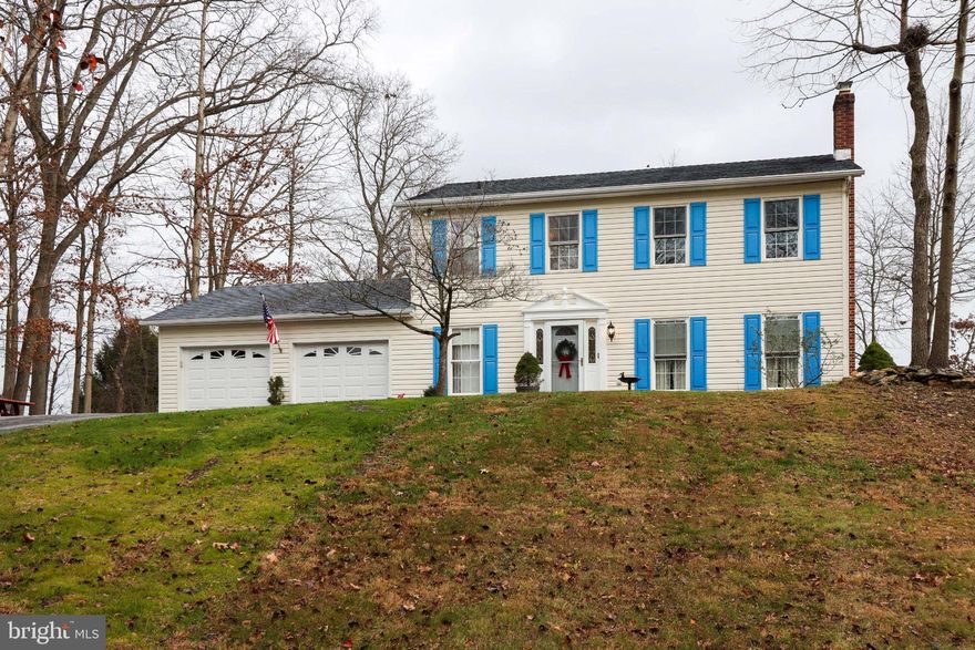 Spacious Colonial in Winterberry Section of Aspen. Three full floors of living.  Enter the foyer to the living room or kitchen. Separate Dining room off kitchen and living room or office.  Kitchen comes with all appliances and loads of cabinets.  Family room is 20 x 25 with windows all around slider to the side yard; door to small deck.  First floor laundry off kitchen and oversized garage. The upper floor boasts 4  bedrooms and 2 full baths. The lower level has a second family room with a cozy wood burning stove, a full bath, and another whole section which was used as a workshop or 5th bedroom suite but has multiple options.  Plus there is lots of storage with built-in shelves.  French doors to walk-up stairs to back yard.  Some of the other extras include  new paint and carpet, a large shed, a camper pad with an electric box, an oversized asphalt drive, Comcast high speed internet, and two new air conditioning units. Soooo much potential throughout.