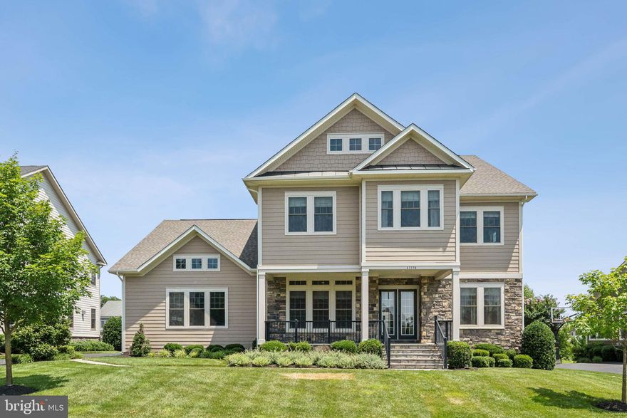 Experience the charm and lifestyle of one of Northern Virginia’s most sought-after communities—Willowsford!  Located in The Grange, a premier enclave within the neighborhood, this stunning seven-bedroom, five-bathroom Timberneck model by Van Metre Homes blends timeless elegance with modern functionality, offering the perfect place to unwind, entertain, and create lasting memories.
<br><br>
From the moment you arrive, the charming front porch and beautifully landscaped yard set the tone for the warmth and character found throughout the home. Inside, an open-concept layout connects each space seamlessly—ideal for everyday life and effortless entertaining. Rich hardwood floors, soaring 10-foot ceilings, and designer lighting elevate the ambiance, while thoughtful upgrades like a spotless three-car garage with epoxy floors, EV Charger,  and custom shelving, plus a private elevator ensure convenience and flexibility at every turn. The elevator is a standout feature, making multi-generational living or aging in place truly effortless.
<br><br>
At the heart of the home, the show-stopping kitchen shines with custom cabinetry featuring glass accents, top-of-the-line appliances, a huge center island, and built-in storage. A generous walk-in pantry and light-filled breakfast room complete the space, while the adjacent family room with a cozy gas fireplace and the formal dining room and study offer the perfect balance of casual and refined living.
<br><br>
Upstairs, the luxurious primary suite provides a peaceful escape with plush carpeting, a spa-inspired bath featuring a soaking tub and frameless glass shower, and an impressive walk-in closet with custom built-ins. Four additional bedrooms and a flexible bonus space ensure there’s room for everyone.
<br><br>
The finished walk-out basement extends the living space even further with 10-foot ceilings, a spacious rec room, a media room ready for movie night with built-in AV, two extra bedrooms, a full bath, and generous storage throughout—ideal for guests, hobbies, or entertaining.
<br><br>
This premium level lot is a blank canvas ready for your dream backyard. Whether you desire a pool, play areas, or outdoor living features or all of the above, this backyard can fulfill those dreams! 
<br><br>
Living in Willowsford means enjoying award-winning amenities, top-rated Loudoun County schools, access to major commuter routes, and a lifestyle rich with nature, community, and farm-to-table charm. Don't miss this rare opportunity to own a standout home in The Grange—where comfort, style, and thoughtful design come together beautifully.