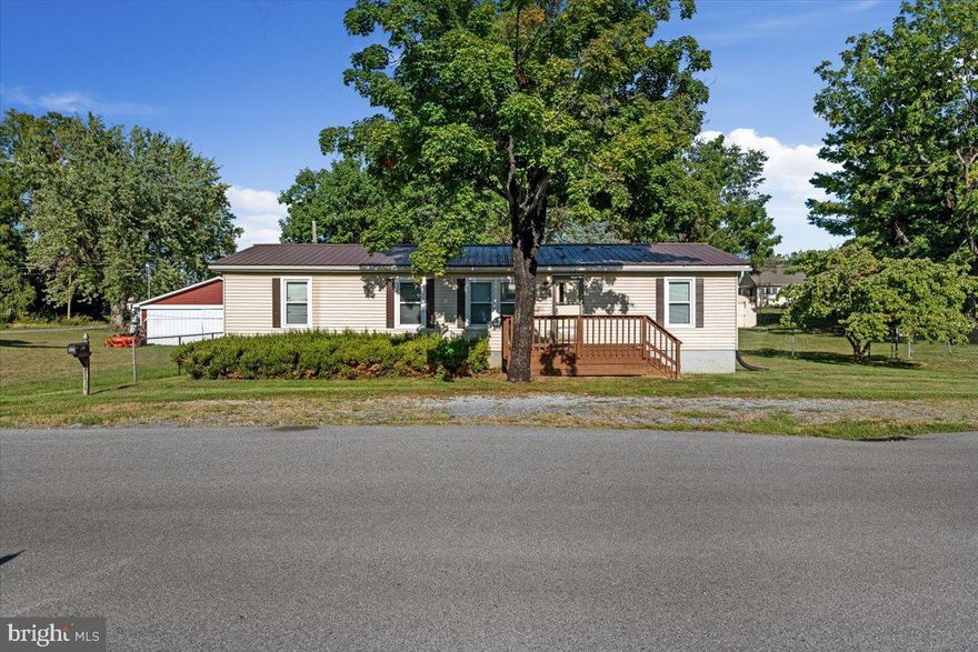 This 3 bedroom, 2 bath 1986 doublewide sits on five, cleared city lots in Ranson. So much potential to repair and/ or build on. Public water, public sewer, electric hookup is all available. This property does have subfloor damage and will not support any mortgage financing.