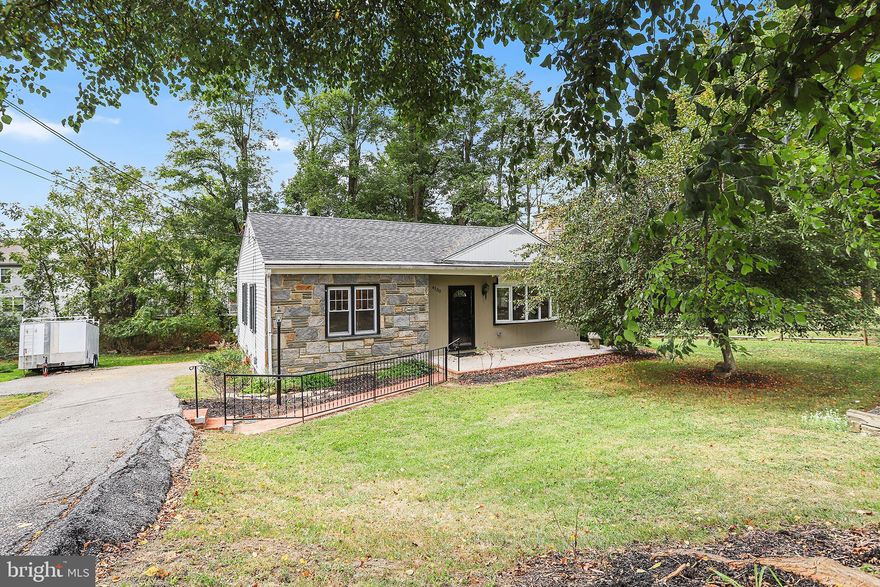 Welcome to this newly renovated 4 BD, 2 BA stone ranch home located in Upper Chichester.  Approach the home by way of the expanded driveway with parking for multiple vehicles.  A brick walkway leads to a large front porch which opens to a bright and sunny living room complete with hardwood flooring, recessed lighting and an impressive wood burning fireplace with shiplap accent wall.  Hardwood flooring and recessed lighting continue into the open dining room with direct access to the impressive kitchen.  The kitchen features a basketweave backsplash, stainless steel appliances, and granite countertops with a large peninsula for additional storage and easy entertaining.  The rear deck is easily accessible from the kitchen by way of sliding doors and also provides access to the backyard.  Back inside enjoy the benefits of single story living with three spacious bedrooms all with hardwood floors, fresh paint and overhead lighting.  The updated hall bathroom features an oversized vanity and modern wall sconces.  The fully finished, walkout level, basement offers an additional bedroom and full bathroom as well as a large family room.  Also on this level is a laundry room and utility room with builtin storage.  Updates include new 200amp service and panel, water heater, connection to public sewer and dual pane replacement windows throughout.  Conveniently located near schools, shopping and public transportation.