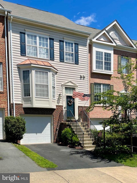 Photo of 9818 Cheshire Ridge Circle, MANASSAS, VA 20110 (MLS # VAPW2129510)