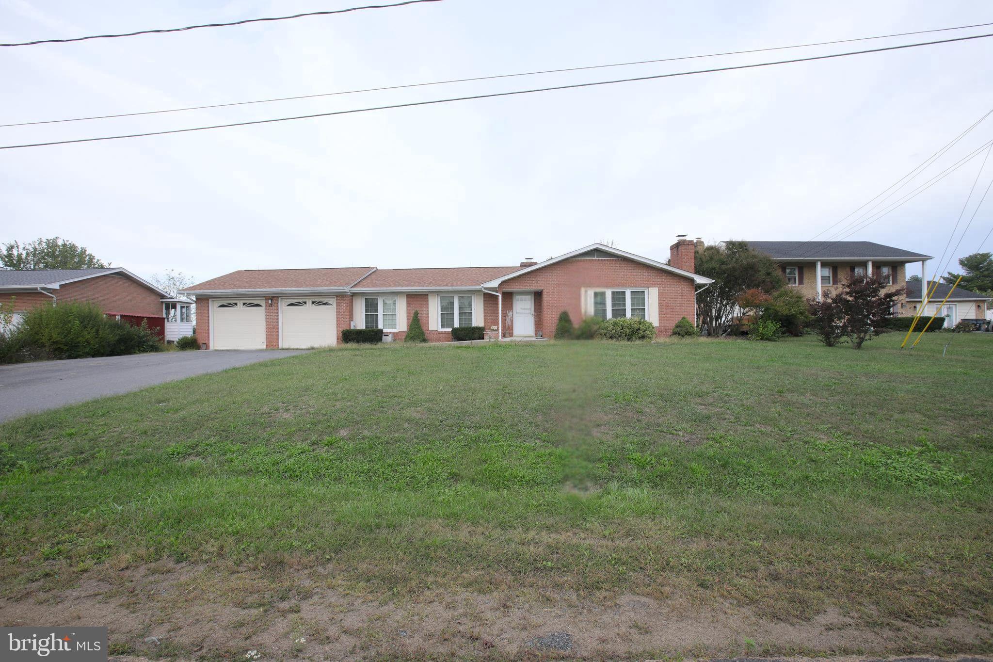 Ranch-style home with front yard and endless potential in Stephens City!
This classic brick rancher sits on a level lot in a well-established neighborhood, offering the convenience of single-story living with plenty of space to spread out. Featuring 3 bedrooms and 2.5 baths, this home boasts a spacious living area. 
Enjoy the comfort of carpeted floors, large windows that flood the rooms with natural light, and a flowing layout that offers both functionality and warmth. The 2-car garage adds convenience, storage, and value.
Located just moments from shopping, dining, and Route 81 access, this home is ideal for commuters or anyone looking for quiet suburban living with everyday essentials close by.
Whether you're dreaming of a sleek new kitchen, updated baths, or modern finishes throughout, this home offers a great opportunity to build equity and create your vision.
A perfect opportunity for homeowners or investors looking to make a smart move in a desirable location.