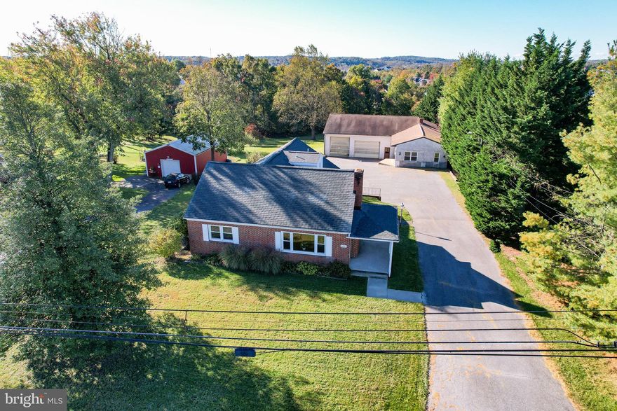 Needing both a HOME and a GARAGE?! This 6 bedroom, 4 Full Bath home with a Spacious Detached Heated Garage offers room to grow and a RARE opportunity you won’t want to miss! Situated on 1.28 acres, this delightful Cape Cod may have a cozy look, but step inside and discover an interior with plenty of space for comfortable living, flexible options and abundant storage! First floor Primary Bedroom offers NEW carpet, a walk in closet, sun/sitting room or study and a shared Full Bath with radiant heat flooring! The two remaining 1st floor bedrooms and living room area all have beautifully refinished hardwood floors! First Floor Laundry! The Second floor offers another Full Bathroom, 3 extra closets including a cedar walk in closet, in addition to 3 spacious bedrooms with built-ins & closets. Plumbed for lower level kitchenette, this finished basement space offers a full bathroom with walk in shower and is ready for your flooring of choice. With a double Egress window and direct entrance from the 2 car garage, there's potential for an in-law like suite or an additional bedroom space! NEW Roof 2019. NEW 1st floor windows 2021. NEW HVAC 2022 1st floor (with the exception of primary suite & sunporch) & basement. NEW French drain 2022. NEW Garage Furnace 2023. See documents for other improvements. The oversized detached heated garage provides a rare opportunity for a garage/workshop or hobby/creative studio, adding to the property’s exceptional versatility. With its charm, size, and unique potential, this property is full of promise for both living and working! Minutes from Route 70, there's ease of proximity for business, commuting, shopping and entertainment options! Schedule your showing appt. to explore what this property could mean for you!