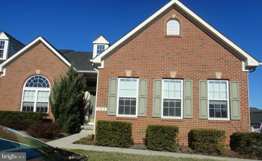 This end unit home has been freshly painted and new neutral carpet installed throughout.  Lg. family room and Dining area w/vaulted ceiling.  Kitchen has island, breakfast bar, and sun room that leads to deck. Laundry room on main level leads to attached 2 car garage.  Lg mstr br w/full ba and walkin closet. Two bedrooms upstairs w/open loft, full bath and large storage closet. Full unfin. bsmt.