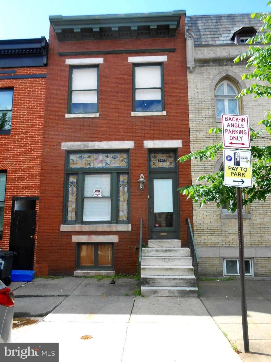 Huge rental in Highlandtown with 4 bedrooms, (one is a walk through) Front Parlor, formal living and dining rooms. Large eat in kitchen.  This house is perfect for room mates and large families.  Many historical touches. Parking pad in the back that will accommodate two vehicles.   Pets on a case by case basis. Washer and Dryer in basement.  Coldwell Banker charges an additional $50.00 commission to renter.  Application fee $50 per applicant