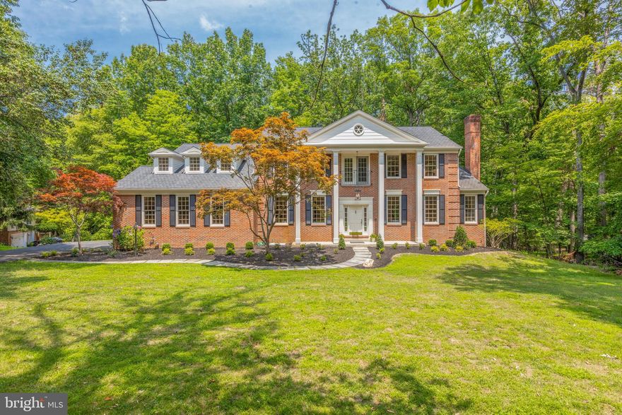 NEW IN FAIRFAX STATION! This home has had one owner and has been loved for over 35 years--it is ready for the next owners to update and add their personal touches. Here is a wonderful opportunity to purchase a spacious estate on 2+ private wooded acres. This gracious Georgian-style home offers custom moldings, beautiful HDWD floors, and 10' ceilings on the main level.  With 4356  SQ FT above grade, approximately 2000 SQ FT below grade in the unfinished walkout basement, and an attached two-car garage, storage is not an issue--and the design of the floor plan insures there is ample space for gathering together with friends and family, or for private work and study. 
 From the columned portico, a welcoming entry foyer opens to the elegant living room (24'x18')with a wood-burning fireplace and marble surround. The formal separate dining room (19.5'x16') features a crystal chandelier and casement bow window overlooking the wooded lot. Opposite the living room is a private home office (15.5'x16')with built-ins, just right for closing off the world and working from home in a beautiful space. Extending across almost the entire length of the house, a 21'x16' eat-in kitchen with breakfast nook and bay window flows into the 24'x18' family room with beamed 10' ceilings. Two French doors flank a masonry brick fireplace and open to a generous deck for outdoor gatherings. Upstairs, the master suite  (21.5'x25') includes an additional attached sitting room (13.5'x15.5'), walk-in closet, and  spacious master bath with jacuzzi tub, separate shower and double sinks. Three additional bedrooms and 2 additional bathrooms complete the 2nd level. The 2+ acres lot is partially landscaped in the front and left in a natural state in the back--easy to maintain but with endless possibilities for clearing, adding hardscape, even a pool.
If you are looking for a post-Pandemic Paradise, this home is located just 2 miles from wonderful  2,000- acre Fountainhead Regional Park, with bike paths, hiking and equestrian trails, boat rentals and ramps and other amenities. Shopping is close by, too, just 3 miles to groceries, gas station, and restaurants. Lorton VRE is approximately 6 miles, and Burke VRE is approximately 7.5 miles. Springfield Metro is approximately 11 miles (about a 20 minute drive). 
 Offered entirely AS IS.