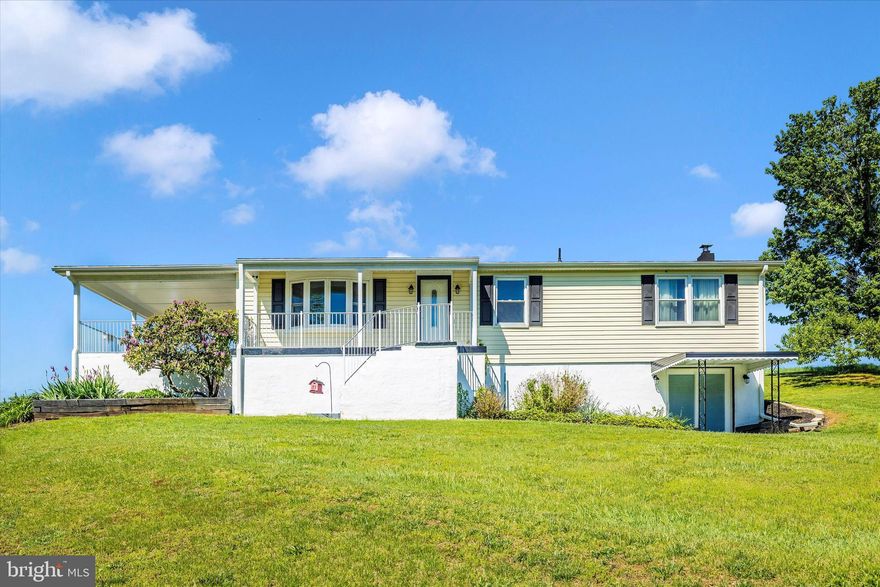 Welcome to your dream property! This charming 3-bedroom, 1.5-bathroom home is set on a picturesque 2.48-acre lot with breathtaking views of rolling pastures and a stunning mountainside. A gardener’s paradise awaits, featuring several garden beds, peach and apple trees, berry bushes, and beautifully landscaped grounds. Four sheds provide excellent space for tools, equipment, or additional storage. Inside, enjoy hardwood flooring on the main level and an updated kitchen with hard surface counters and beautiful cabinetry. The basement offers a wood stove for cozy evenings, ample space for hobbies, and plenty of storage. Enjoy peace of mind with a new roof (2025) and an HVAC system less than a year old. This property offers comfort, charm, and functionality — don't miss your opportunity to make it yours!