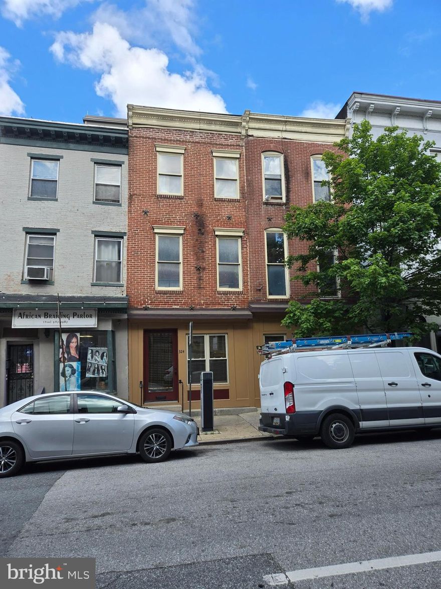 Totally renovated in 2007 and 2024.   Gleaming hardwood flooring main level.   First floor apartment is two bedrooms and two full new baths.  Lower level apartment has two bedrooms and two baths.    The building can be 3 apartments or it can be retail on the main level and 2 bedroom 2 baths in the basement.  Zoning is C 5.  Each apartment has its own washer/dryer.  Each apartment has a separate gas-fired forced air heating and air conditioning system pllus a separate hot water heater.    The building is certified lead free.
