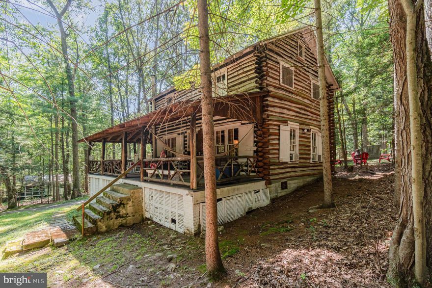 Must be a cash buy or use a line of credit,  Looking for a getaway cabin to take the family for summer, fall and Christmas festivities? This may be the perfect cabin that fits all your extended family needs. Sitting in the mountains of Doubling Gap, this 1,400 square foot log cabin home comes with 4 bedrooms, 2 full baths on almost a half-acre of leased land-10 year lease is $200 plus you pay your own real estate taxes of $1,476 a year. Must be a cash buyer only. Property has indoor plumbing and septic-rare find on game lands, zoned, seasonal use, but does not state length of time you can stay within a year. All original hardwood floors throughout this beautiful home. Wrap around porch, full kitchen, walking trails extend to end of property bounderies, hunting permitted in the State Forest. Across the road is a pond for fishing as well as Colonel Denning State Park- hiking- mountain biking-picnicking-swimming, horseback riding trails. Great price and ready for the new buyer to bring their family and make memories for the next few decades.