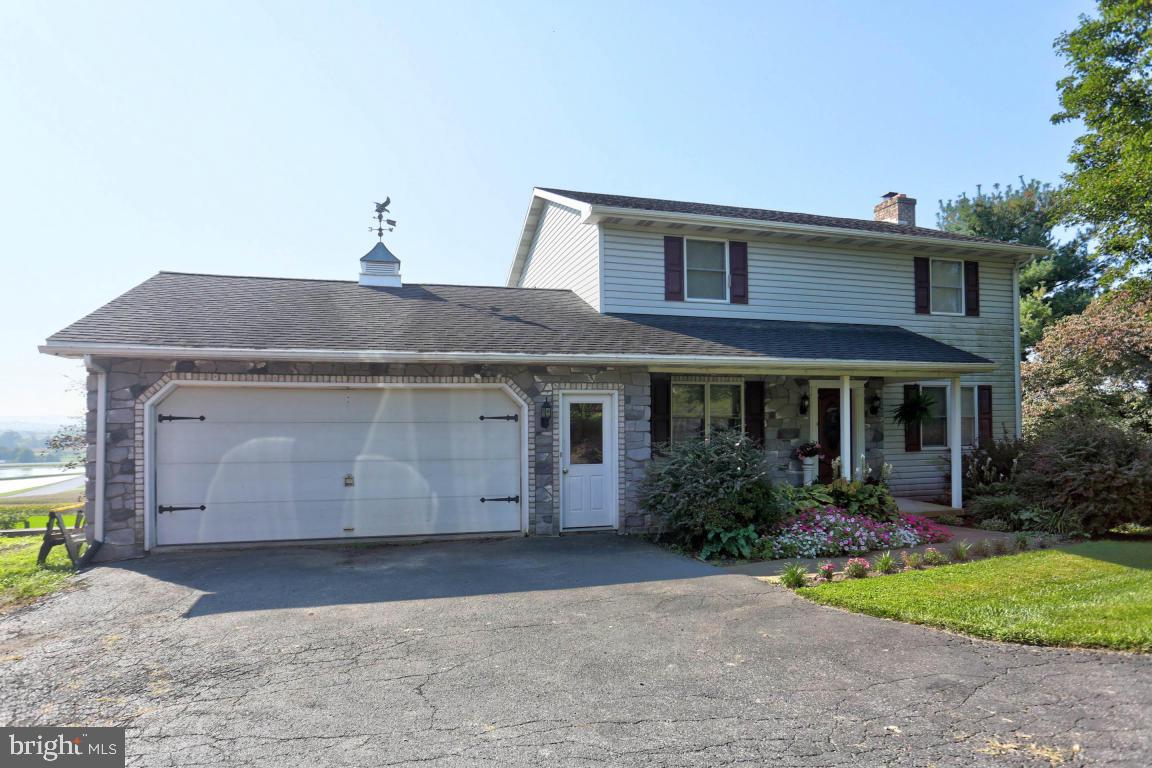 Come see the view that everyone wants but not everyone can have!!! This 3 bed, 2 1/2 bath home features a master bedroom and master bath along with a partially finished walk-out basement and a two car garage. This 1/2 acre property is on the south side of Himes Hill in Eastern Lancaster county school district. Enjoy the patio in the backyard along with the fire pit, all of this is complimenting the incredible view.