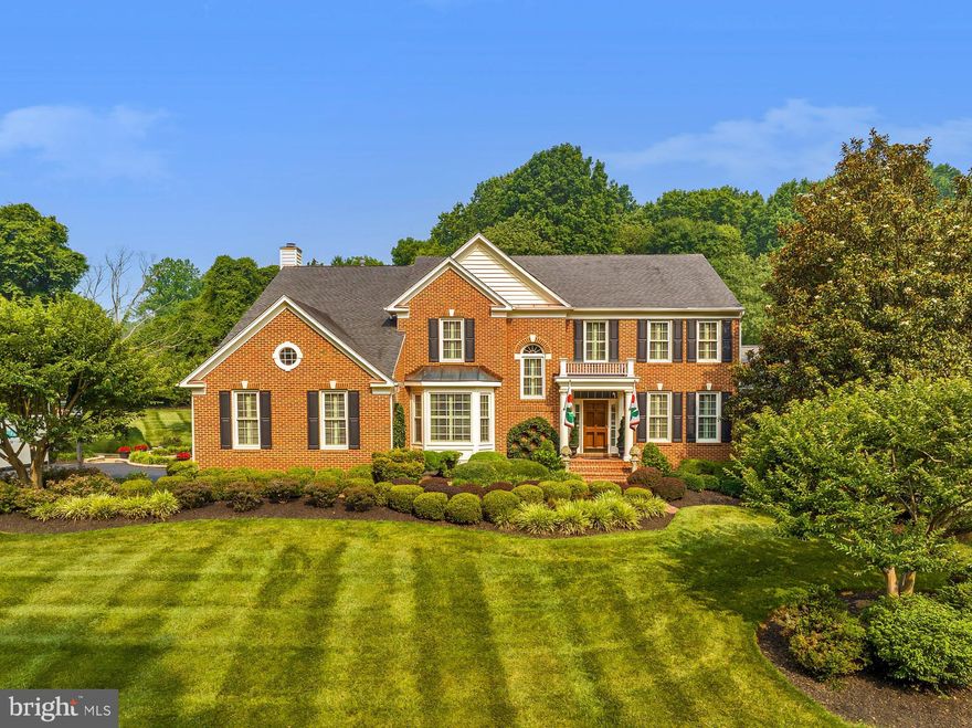 Magnificent brick Colonial in sought after Hunt at Fairfax Station. Well positioned on a nearly acre lot, this property is gorgeous with a flat backyard, in-ground swimming pool and well-maintained, professionally landscaped grounds. Privacy can be enjoyed from so many outdoor living/entertaining areas. Enter the 2-story Foyer and be welcomed by the beautiful architecture of this home. From the 9+ foot ceilings, gorgeous hardwood floors, crown molding and chair railing to the large windows with plantation shutters throughout, you will be amazed with all this home offers. Greet guests in the formal Living Room or enjoy a meal in the adjoining Dining Room. Step outside to enjoy some relaxation on the open and airy porch with its lovely wooden ceiling, ceiling fan and recessed lights. Inside the Gourmet Kitchen be impressed with the natural cherry cabinets, expansive island and high-end appliances such as the built-in refrigerator, new Bosch wall oven and microwave, warming drawer, ice machine, Miele speed oven and 6-burner gas cooktop. The Kitchen overlooks the enormous Family Room with a stone fireplace, oversized Palladian windows and back staircase. Off the Family Room is the light-filled Sun Room with loads of windows and direct access to yet another entertaining area out back. The main level is finished with a private Office and Powder Room. Ascend the stairs to the enormous Master Suite which boasts a separate sitting area, two walk-in closets, crown molding and a luxurious Master Bath. Down the hall is another Bedroom with ensuite Bathroom, while the other shares a hall Bath. One Bedroom has been converted to an amazing Laundry/Hobby Room with built-ins and pull-out shelves. The lower level recreation room has plenty of room for the whole family and offers a mini-kitchen for ease of entertaining. There is another large Bedroom and Full Bath for your loved ones or guests. The Exercise Room has professional-grade rubber flooring, recessed lights and a ceiling fan. Back outside, enjoy outdoor cooking while sitting on the spacious deck overlooking the beautiful backyard, or take some time to relax in the hot tub. For those hot days, take a dip in the in-ground pool with its Pebble Tec finish. This home has it all with so many places to entertain from the Gourmet Kitchen to the grand Family Room, the bright Sun Room, the open and airy Porch or any of the other amazing outdoor areas. All this backing to trees in sought after Hunt at Fairfax Station and in close proximity to Rte. 123 and the Fairfax County Parkway. Enjoy all that Fairfax County has to offer with local parks and golf courses. Welcome Home!