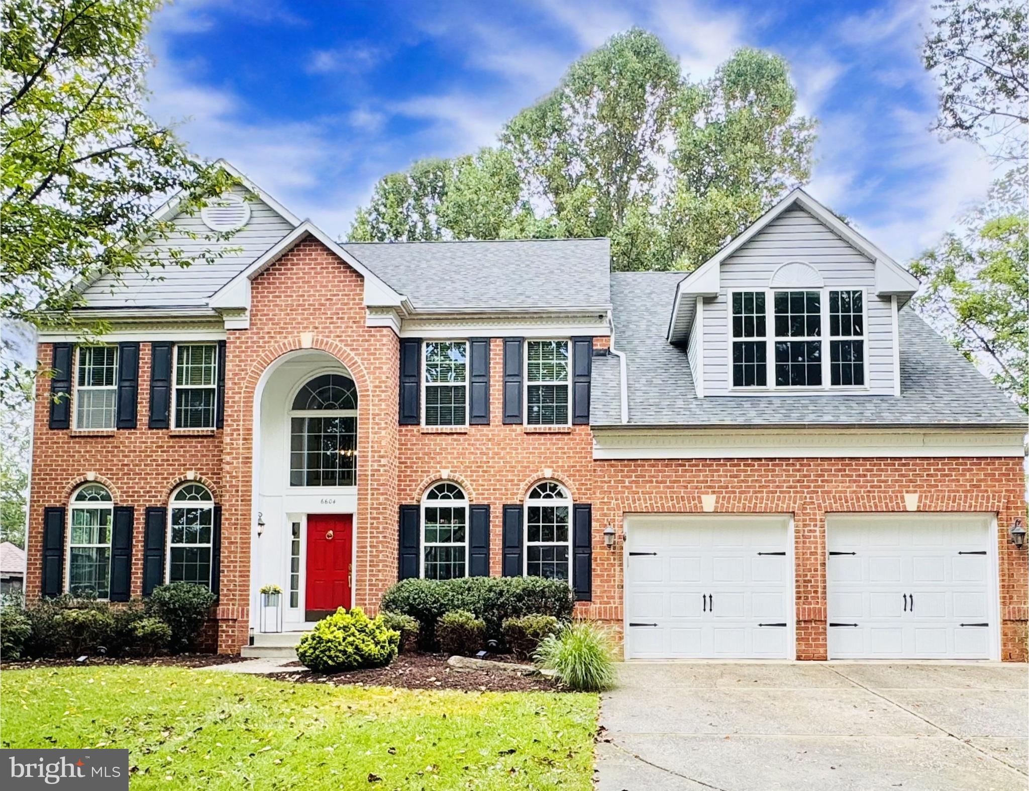 Luxury Living in Clarksville with NO CPRA, and RIVER HILL HS! Welcome to this beautifully updated brick-front Colonial, ideally situated on a peaceful and private street in the highly sought-after River Hill community. This stunning home, with an open concept layout, is move-in ready with extensive upgrades throughout. Step into the heart of the home – a fully renovated gourmet kitchen (2024) featuring new stainless-steel appliances, a quartz island and quartz countertops, soft-close custom white cabinetry, glass subway tile backsplash, wall oven, and a high-end six-burner range. The space is finished with recessed lighting, a built-in microwave, walk-in pantry, and a convenient butler’s pantry. A sliding glass door leads from the kitchen to a new expansive Trex deck (2025), with built-in lighting and Bose outdoor speakers. Enjoy cozy evenings in your secluded, fully fenced 0.40-acre yard, with a paver patio and built-in fire pit, all while surrounded by mature trees and lush greenery. Inside, the home welcomes you with a dramatic two-story foyer with sidelights and a contemporary chandelier, leading to formal living and dining rooms, adorned with arched windows, decorative moldings, and hardwood flooring. The impressive two-story family room with hardwoods and gorgeous arched windows features a cozy brick gas fireplace with modern shiplap extending to the ceiling – a true showstopper. A renovated mudroom (2024) with custom tile flooring and built-in lockers adds function and style, while a main level legal bedroom or office, plus powder room, offers versatility. Upstairs, the spacious primary suite is a private retreat with vaulted ceilings, a walk-in closet, and a cozy sitting area with a window seat with storage underneath. The spa-inspired primary bath (renovated 2022) includes a double vanity with custom cabinetry, a freestanding soaking tub, modern lighting, and a frameless walk-in shower with stone flooring and designer tilework. Three additional bedrooms with lighted ceiling fans, and a full hall bath with double vanity, ceramic tile flooring, and tub / shower combo, complete this level. The fully finished lower level, perfect for entertaining or multi-generational living, features a recreation room with floor-to-ceiling stone gas fireplace, recessed lighting, game room area with pool table, and a wet bar with cabinetry and mini-fridge. Two oversized bonus rooms offer potential as additional bedrooms (bedrooms six and seven) or a private office and den. The renovated third full bath (2024) offers a walk-in glass shower with shampoo niche, bench, custom flooring, and a quartz vanity. A laundry room and walk-out slider to the backyard complete this versatile space. Additional upgrades include dual zoned HVAC systems (upper unit replaced in 2025), and brand new upgraded, insulated garage doors (2025). Hot water heater (2019) and roof (2014). 4748 finished Sq. Ft. and HOME WARRANTY included. HOA with no fees. Truly a stand-out home!