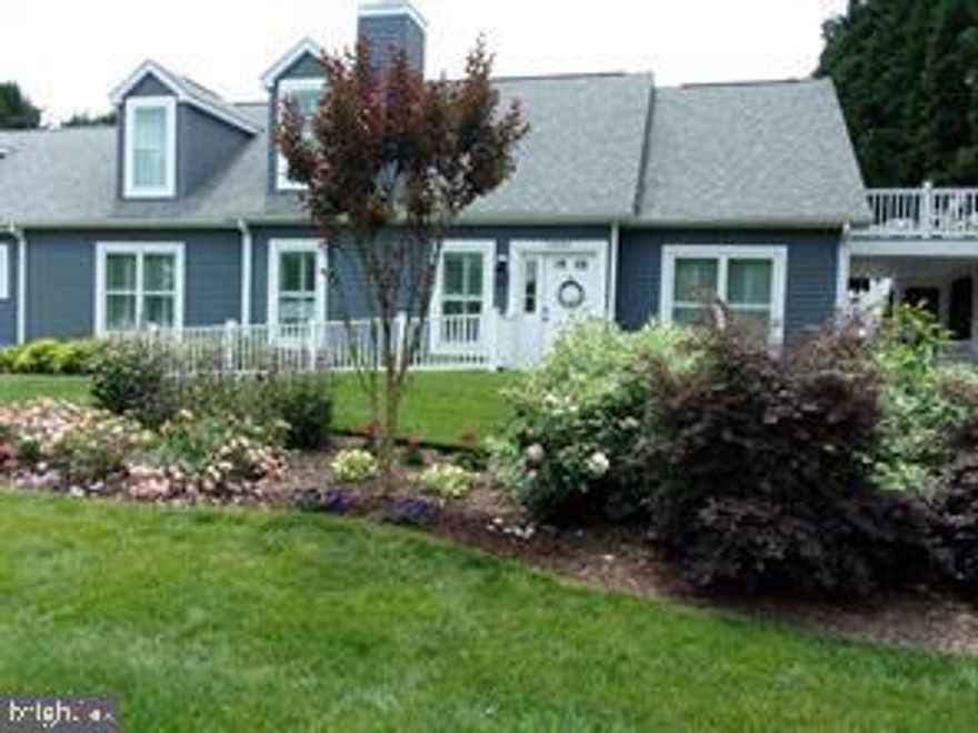 As featured on TV's WBOC Delmarva Home Show, this 3,250+ sf custom-built colonial in Dagsboro blends both comfort and elegance, ideal for coastal living with no HOA.  The professionally landscaped 
.81 acre lot has year-round floral color and ample backyard space for a large garage, swimming pool or hard-scaped living area.   Property is surrounded by mature trees on 3 sides, giving a natural border for privacy. 
Inside, natural red oak floors, an open-concept layout and a wood-burning fireplace create an inviting atmosphere, complimented by surround sound and panoramic backyard views from large sliding doors.  The kitchen features GE stainless appliances, granite countertops, and a large prep island.  This main floor also includes 2 bedrooms, 1 bathroom, a laundry/mudroom with new washer/dryer, and a versatile 26' x 26' bonus room suitable for endless uses.  
Upstairs provides 3 more bedrooms, 1 bathroom and a rough-in for an ensuite bathroom in the largest bedroom and a sitting area with access to an elevated TimberTech deck.   Throughout the home, the windows have Hunter composite plantation shutters; geothermal HVAC with mini-splits in select rooms; a climate-controlled encapsulated crawl space with French drain; whole-house Generac generator and a propane Rinnai tankless water heater ensuring reliable comfort for all.  Both bathrooms have heated tile floors.  The home is freshly painted, and all systems have been recently inspected.  
This property is centrally located, allowing for easy travel without having to contend with heavy summer traffic.  Bethany Beach and all its activities are only a short 21-minute drive.  In addition, the property is only 7 minutes from Rt 113, a major thoroughfare providing direct routes to destinations both north and south, making it simple to reach other points of interest on the Eastern shore. 
If you are searching for a stunning home that seamlessly blends style and comfort, this property is truly a must see.  Its exceptional aesthetic and quality of finishes set it apart as a remarkable opportunity.