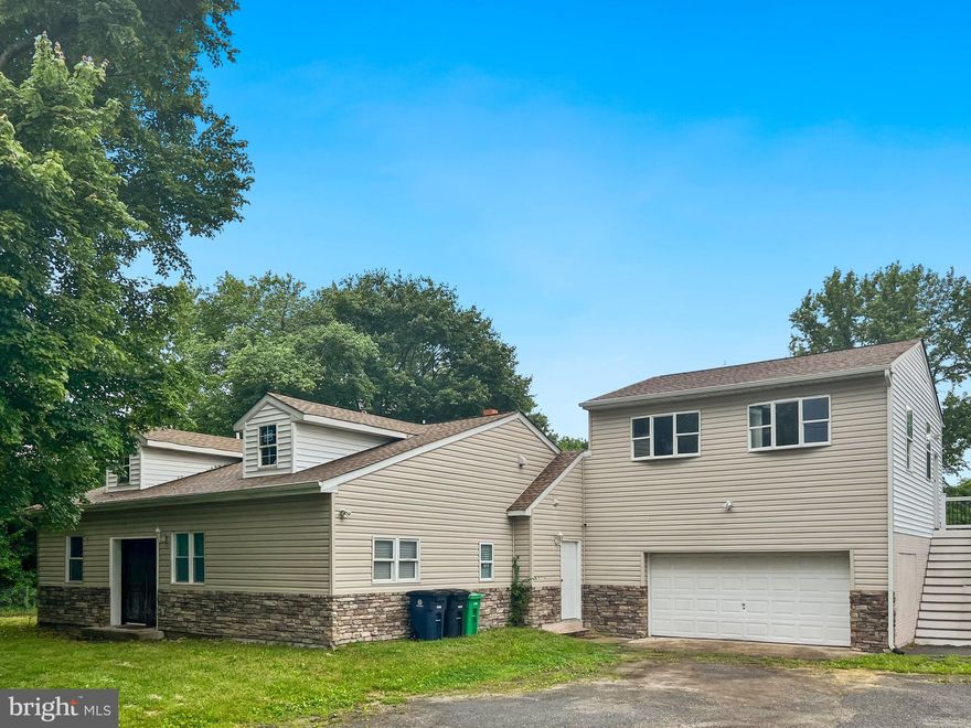 Welcome home! This fully remodeled 4-bedroom house, perfect for entertaining, also features an attached 1-bedroom apartment with a separate entrance, water heater, and heating/cooling system. Nestled on a spacious .92-acre lot, the property boasts a large driveway and ample outdoor space for your enjoyment.

The open kitchen concept, designed for the at-home chef, includes custom cabinetry and stunning quartz countertops. The primary suite, thoughtfully converted from two bedrooms, provides generous space for relaxing, plus a cozy sitting area or desk space. The suite also offers a large walk-in closet and a luxurious bathroom, complete with a Jacuzzi soaking tub with jets, radio, and lights, a double vanity, and a walk-in shower adorned with hand-laid tile.

Each of the three guest bathrooms features beautiful hand-laid tile and high-efficiency toilets. Additionally, all street-facing windows are triple-pane, ensuring both energy efficiency and noise reduction. This home combines elegance, comfort, and functionality, making it a perfect retreat for its next lucky owner.