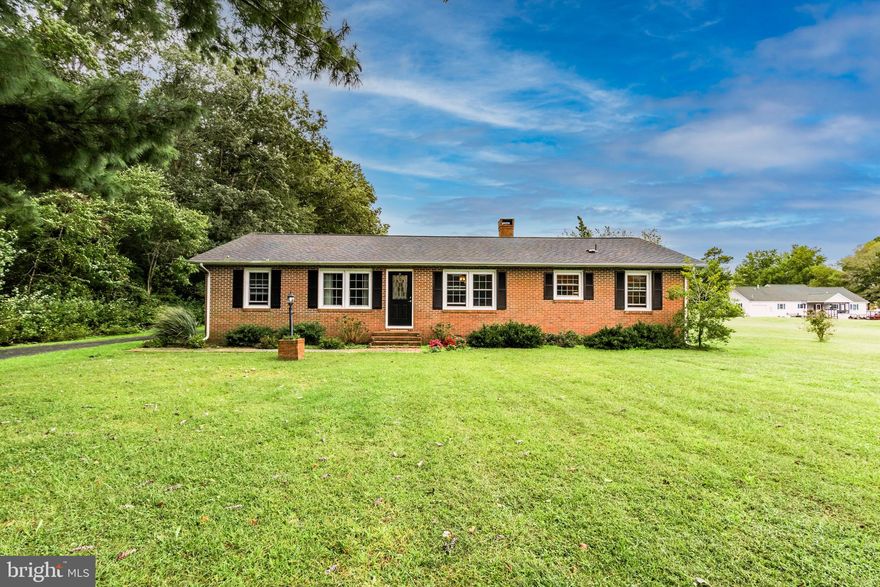 Welcome to your dream home, where modern living meets serene countryside charm. This charming 3 bedroom, 2 bathroom rancher sits majestically on a sprawling 2-acre parcel of land, offering the utmost in privacy and tranquility. Living room and dining area features a brick wood fireplace and large open floor plan. Additional area off the living room could be used for an office or craft room.  Imagine sipping your morning coffee on the screened porch, surrounded by nature's beauty. The large den, perfect for entertaining, offers a focal point for social gatherings and memorable moments with friends and family.  A spacious outdoor storage shed provides ample space for outdoor equipment and more. Plus, the workshop, complete with electricity, offers a creative haven for DIY projects, woodworking, or whatever your hobbies may be. Nestled in a tranquil area of Berlin, this property is a true gem that offers an expansive yard, mature trees, and the best of both worlds - peaceful rural living with urban amenities just a short drive away. Schedule a showing today and discover the endless possibilities that await you in this idyllic setting!