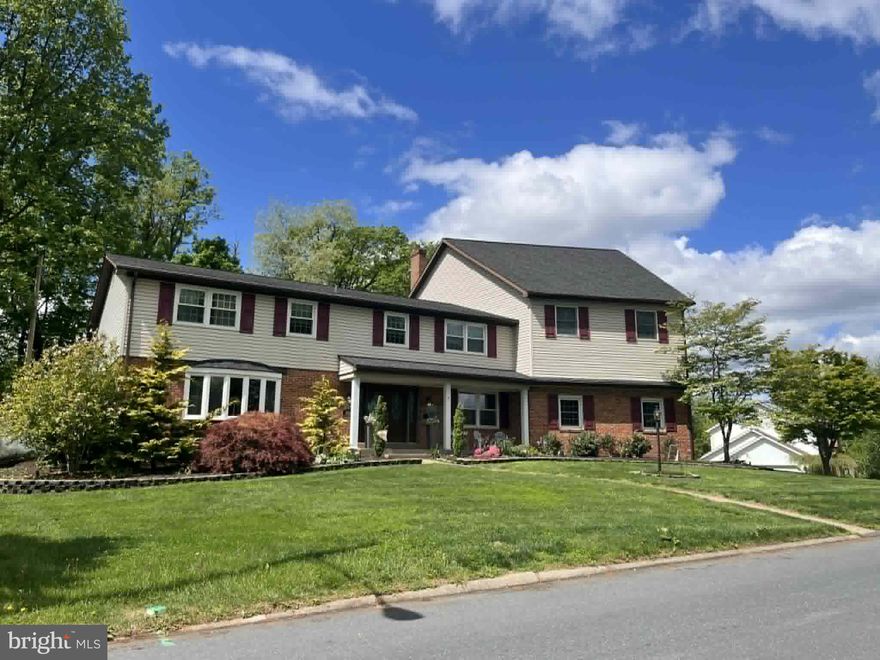 Experience unparalleled luxury in this masterfully redesigned 5 bedroom 4.5 bath home near the  West Shore Country Club. Upon entering, you are welcomed by a grand two-story foyer anchored by a sweeping curved staircase and an authentic Murano glass chandelier, flowing into the redesigned chef's kitchen that features a striking waterfall granite island, Thermador gas range, an oversized farmhouse sink, and a dedicated wine and coffee bar—complete with a wine refrigerator for the connoisseur.  Other standout features include solid oak flooring throughout the living room, dining room, and den, leading to a light- filled Great Room with vaulted ceilings, skylights and dramatic floor- to-ceiling brick fireplace. The main level continues with an expansive family room featuring a dry bar, sliding glass doors to the rear patio, and a second floor-to-ceiling brick fireplace. The luxury continues on the upper levels with an oversized primary suite featuring an award-winning Excel en suite a spa -like sanctuary boasting a freestanding soaking tub under the glow of a private chandelier. Equally impressive is the oversized secondary suite featuring walk-in closets and a designer en suite remodeled by Excel.  Another high point of the home is the third floor fitness studio a light- filled retreat featuring private access to the rear balcony and a convenient half bath. The exterior serves as a stunning showcase of curb appeal with  expertly designed and professionally cared for landscaping and integrated up-lighting.  Your own private retreat awaits in the backyard. The spacious brick patio provides plenty of room for lounging and dining, leading directly into the refreshing pool all within the privacy of your fully fenced yard. Lastly, there's space to grow in the partially finished basement, which offers abundant storage and flexible space for future expansion.