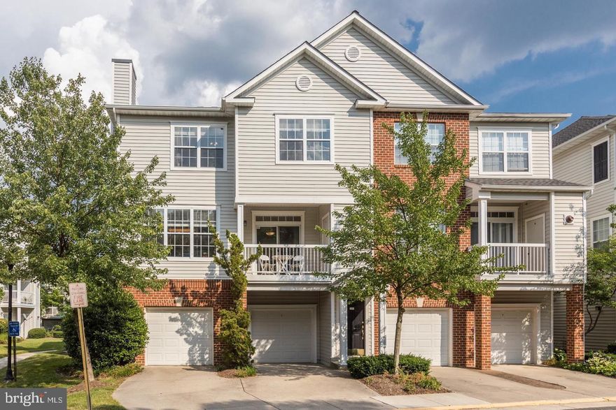 Welcome to this beautifully updated and cared for townhouse-style condo in Herndon! Easily accessible to the Fairfax County Parkway, Route 28, Dulles Airport, and plenty of shops and restaurants, the location is ideal. This corner unit comes with a one-car garage, driveway parking, an extra deeded spot (wow!), and tons of natural light! Entering on the first floor, either through the garage or the front door, leads you to a staircase to the open concept main level. Greeting you is a large dining and living room combination with Acacia Wood Harwood floors, a gas fireplace, access to a balcony, and a gorgeous kitchen. The kitchen boasts 42-inch maple cabinets, stainless steel appliances, granite countertops, and gas cooking. Bonus   there is an island with storage and room for seating, roll-out shelves, and access to the laundry room. This is a cook s dream! And with sightlines into the rest of the main level, entertaining will be easy and fun. Moving to the upper level, you will find the master bedroom with ceiling fan and walk-in closet. The master bath has dual sinks, linen closet, and has been updated with new lighting, medicine cabinet, faucets and toilet! There are two additional bedrooms with ceiling fans, and one of the rooms has two closets. Tons of storage! These additional bedrooms share a hall bath that has been recently updated with new fixtures, lighting, and tile on the floor and in the tub. This unit offers a ton of space, tasteful upgrades and fixtures. Ideal location, and wonderful community amenities.