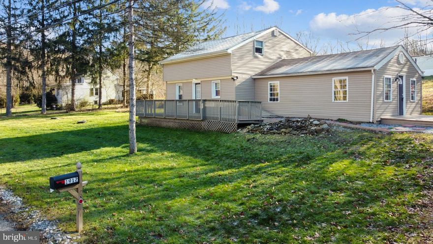 A two-story single home in West Caln.  Situated on a nice lot off of Telegraph rd. The home has 2 bedrooms on the first floor with a full bathroom.  The garage has been converted into a large gathering room.  Not noted in published square footage.  A small, remodeled kitchen completes the first floor.  Upstairs you will find 2 quirky bedrooms with a full bath.  The front entrance has a large deck & a pond.  The side entrance to the gathering room has a platform for an easy entrance.  The driveway is crushed store.  Enough for 3-4 cars.  The side yard is sizable.  Back yard is small & backs to other homes.  Low taxes & convenient to major roads.