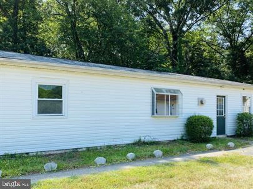 Enjoy the comfort of one-level living in this 3-bedroom, 1-bath rambler set on a wooded lot that backs to trees. The home features a welcoming living room, a separate dining area, and an eat-in kitchen with ample cabinet storage and appliances. The full bathroom includes a shower/tub combination, and the laundry area offers hookups for added convenience. Each of the three bedrooms provides functional living space, and large windows throughout the home allow for plenty of natural light. Outside, mature trees create a peaceful setting and natural backdrop.

Conveniently located just off Benchmark Road, this home is only 3 miles from downtown Fredericksburg and the VRE, with easy access to shopping, dining, parks, and recreational opportunities.

**This property features window air conditioning units instead of central air.
------------------------------------------------------------------------------------------------------------------------------------

CREDIT: All Credit Considered
PETS: Yes, case-by-case
PET FEE: $450/pet non-refundable fee
VOUCHERS: Housing Choice Vouchers accepted
UTILITIES: Tenant Pays All
APPLICATION FEE: $65 per applicant
SECURITY DEPOSIT:  Minimum One month's rent (Please note that in certain cases, a double deposit may be required)
RESIDENT BENEFIT PACKAGE: $25/month
LEASING FEE:  $125 One time due with Move-in Funds.