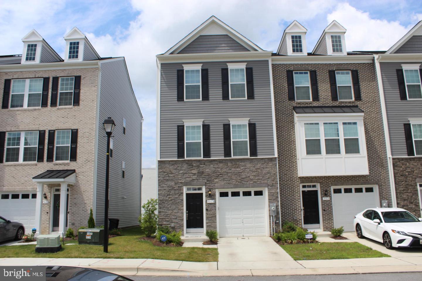 Opportunity to rent a beautiful, newer TownHome! Bright and spacious 3-level unit in the sought-after new community. With thoughtful upgrades, beautiful artistic frames, and beautiful wood flooring throughout. Ground-level recreation room. Main level features an open floor plan with a dining room, kitchen, and living room combo. Powder room. Spacious kitchen with oversized cabinets, island, and stainless steel appliances. Sliding door off the kitchen leading to a large deck. Upper floor master suite with double walk-in closet, luxury master bath with dual vanities. Laundry room upstairs. 1-car garage. Very convenient location, close to NASA, U. Maryland, and USDA. Minutes to I-495, I-95.