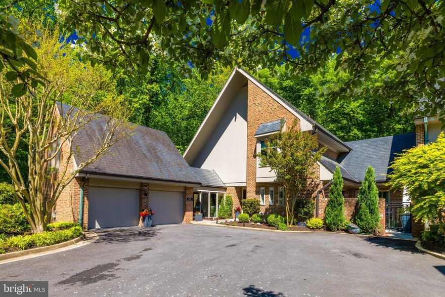 Thoughtfully and completely reimagined by Bonnie Ammon Interiors and Brush Arbor Homes between 2017-2022, this approx. 6,500 SF residence is loaded with custom finishes and designer selections. No detail was overlooked, and the results are show stopping. Nestled in one of Mclean’s best kept secrets, Merrywood on the Potomac, 714 Belgrove is in a lush and very private enclave of just 8 homes just off of the Potomac. A completely renovated, turnkey property of this scale and location is rarely offered to the market.  

The home’s design maximizes every interior and exterior inch through a smart floorplan and vibrantly integrated indoor/outdoor spaces. On the main level, a glamorous foyer and stunning kitchen serve as the invitation to the home’s elegant and grand entertaining spaces.  Volume ceilings and the dining room’s spectacular coffered trim, custom wall coverings and draperies and cast stone fireplace combine a maximalist effect perfectly with serene wooded views through the walls of windows. 

The private family office is charming and functional and leads to the attached two car garage through a fun breezeway, A recently finished space above the garage is accessed from a charming patio and exterior set of stairs. This loft space has been converted to a private office, outfitted with subzero fridges and wine drawers, coffee station and TV lounge area and finished with a fabulous reclaimed wood ceiling.  

The luxury primary suite occupies its own devoted level, boasting more verdant views with incredible bespoke closets that continue the theme of natural textures and stunning custom selections that are truly unexpected and jaw dropping. The primary bath is worthy of a 5-star hotel spa. The fourth level is home to two secondary bedrooms, each with their own en-suite baths and incredibly ample closet space while maintaining the theme and quality of the custom finishes.

The walk-out lower level opens to an expansive showstopper patio with fire pit amidst incredible foliage. Entertaining is made effortless with an acoustically treated theatre room with plush seating and top-of-the-line equipment. Another gorgeous guest bed and bath, rec room with wonderful full wall feature fireplace, bar with beverage drawers and dishwasher and expansive storage room round off the amenities. 

Perched gracefully on the banks of the Potomac River, Merrywood on the Potomac offers a peaceful retreat from the Capitol while maintaining proximity to McLean’s excellent amenities. With shopping, dining, and major commuter hubs like Tysons Corner, Washington D.C., and Reagan National Airport just a stone's throw away, convenience meets tranquility and offers turnkey living, just moments from the Capitol.