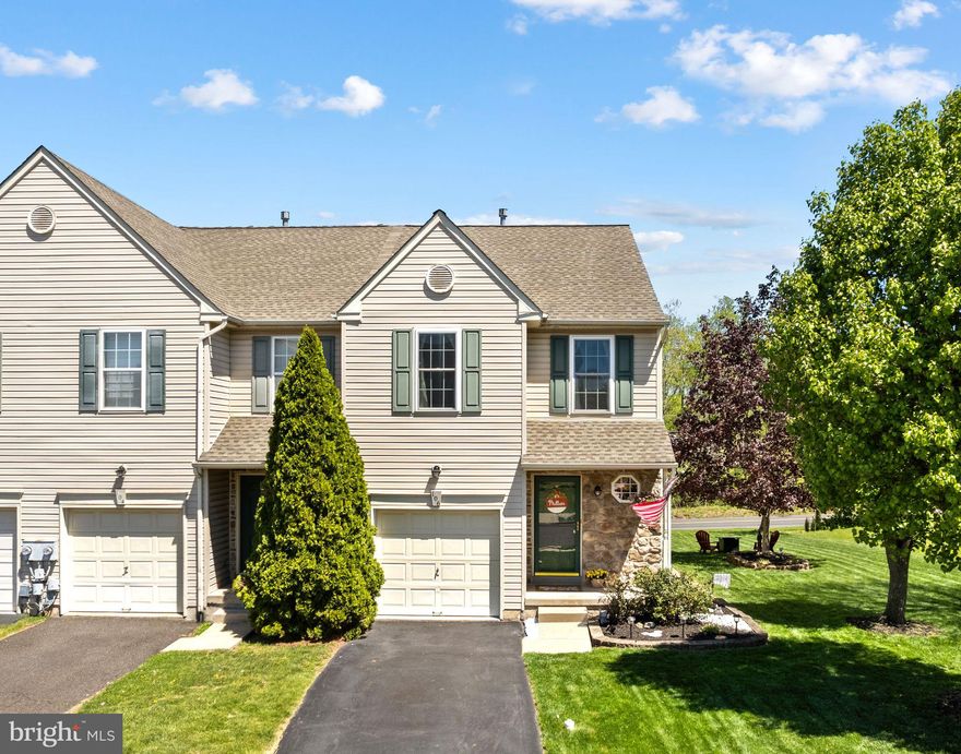 Welcome to 106 Bramble Lane — a beautifully maintained end-unit townhome offering the perfect blend of comfort, space, and convenience in the heart of Perkasie. With 3 spacious bedrooms, 1.5 baths, and thoughtful upgrades throughout, this home is designed for easy everyday living and effortless entertaining.

Step inside to find a bright and inviting open-concept main level featuring a stylish kitchen complete with granite countertops, stainless steel appliances, and plenty of cabinet space, seamlessly flowing into the living and dining areas. A convenient first-floor powder room adds extra functionality for guests and daily use.

Upstairs, you'll find three generously sized bedrooms, a full bath, and the added convenience of second-floor laundry. The fully finished basement provides valuable additional living space—perfect for a family room, home office, gym, or playroom.

Outside, enjoy relaxing or entertaining on the rear deck overlooking the expansive side and backyard space, a rare bonus for townhome living thanks to the desirable end-unit location. A one-car garage and private driveway complete the package, offering both storage and off-street parking.

Additional highlights include central A/C, along with a new heater and A/C condenser installed in 2023 for added peace of mind. The homeowners association offers a very low monthly fee and access to a beautiful walking trail, adding even more value to this wonderful community. Ideally located with easy access to local restaurants, breweries, and cafes in Perkasie and nearby Dublin, this move-in-ready home offers the perfect balance of comfort, convenience, and lifestyle.