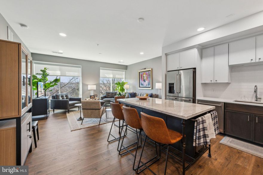 625 Slaters Lane.  First 6 months of condo fees paid by seller.

One of Alexandria's newest luxury, boutique condominiums located off George Washington Parkway and Mount Vernon Trail;  and just 7 minutes to Reagan National Airport..... THIS 1 BEDROOM + DEN (or 2ND BEDROOM) + 2 BATH residence offers a spacious, open floor with numerous upgrades throughout; wide plank flooring, state-of-the art kitchen equipped with hi-end appliances and quartz countertops, large marble top island, spacious bathrooms with quartz and porcelain tile.  The community residences enjoy an abundance of amenities;  including concierge service/ package delivery,  a 24 hour fully furnished gym, a community club room, meeting room/ reading rooms and private spaces, a dog wash room, and an impressive rooftop terrace with grills, fireplaces and incredible views of the Washington DC skyline, Potomac River and airport.  The lower level garage provides 2 over sized parking spaces assigned to this property.   Enjoy easy access to historic Old Town’s restaurants, shopping and festivals;   Del Ray, the Potomac Yard METRO station, Dangerfield Island Marina, the Pentagon, DCA airport and all major highways.