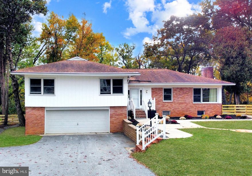 Welcome to 13606 Alliston Drive, a stunning modern farmhouse inspired renovation nestled on over 1.23 acres of private, fenced-in, wooded surroundings in the heart of Baldwin.  With more than 3,100 square feet of beautifully designed living space, this home perfectly blends luxury, comfort, and functionality.

Step inside, where you will find your open concept layout and a gourmet kitchen that will impress any chef—featuring quartz countertops, modern fixtures, stainless steel appliances, and stylish modern farmhouse accents throughout.  Head upstairs to your bedroom level featuring 3 spacious bedrooms, 2 beautifully updated full baths, with a large primary en-suite bedroom & spa-like bathroom. The 2 additional lower levels provide a half bath and laundry room and offer the versatility of anything from a home office, to a rec room, to a home gym or fitness studio...the possibilities are endless.  The open-concept layout flows effortlessly with wide-plank luxury vinyl flooring, abundant natural light, and a cozy wood-burning fireplace that anchors the main living area leading out through your glass sliders to your backyard. Step outside to your amazing rear patio overlooking a fully fenced backyard that backs to woods for ultimate privacy—perfect for entertaining by the firepit, relaxing, or letting pets and kids play freely. A two-car front loading garage and oversized driveway make parking an ease, while the additional storage shed provides extra space for tools or lawn equipment. Ideally located in sought-after Baldwin, this home offers the peace of country living with the convenience of nearby amenities.

Experience the perfect blend of privacy, style, and modern living at 13606 Alliston Drive.