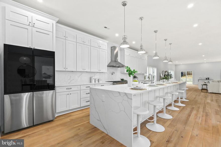 This breathtaking four-story Craftsman blends timeless charm with modern elegance, offering 8,330 square feet of beautifully updated living space. With six bedrooms and seven bathrooms, every detail feels straight out of a magazine, from the gorgeous White Oak floors to the sleek modern light fixtures and recessed lighting throughout. The open floor plan is perfect for both daily living and entertaining, featuring a gourmet chef’s kitchen with an extended marble island that invites gathering. The spacious primary suite is a true retreat, complete with stylish paneling, a walk-in closets with custom built-ins, and a spa-like ensuite. Generously sized additional bedrooms provide plenty of space for guests or personal use. The main systems have been recently updated, the water heater and HVAC are just one year old, and the roof and windows were replaced two years ago. A two-car garage with driveway space adds to the home’s convenience. Nestled off N. Glebe Road, this prime location offers easy access to I-66, Virginia Hospital Center, and is just minutes from D.C., with fantastic shopping, dining, and entertainment nearby. There is an elevator shaft in this home.  Possible bedroom's in the basement. This is a home you don’t want to miss!