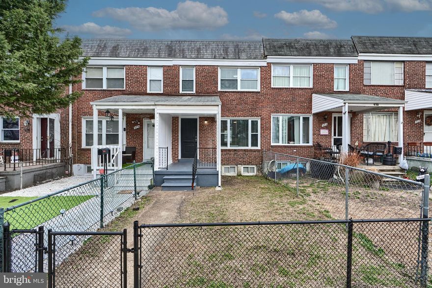 New Roof and Electrical Service Line! Welcome to 972 Elton Avenue, a charming brick townhome in Baltimore! Featuring an inviting open front porch, gated front and back yards with a bonus parking pad. Inside, enjoy hardwood floors, modern off-white paint color, and stylish kitchen with white cabinets, quartz countertops, and stainless steel appliances. Downstairs shows off additional finished living space with LVP flooring, laundry area, storage and rear walk out. With three bedrooms and one-and-a-half baths, this home is move-in ready. New Water Heater, New Roof, Service Line. Set up a showing today!