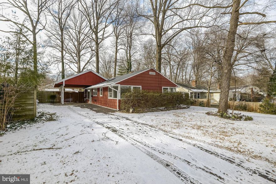 Bright home with vaulted ceilings, a brick accent wall, and a fireplace in the Great Room! Tons of windows, practical layout. Bright kitchen w SS appl, updated bathroom with skylight! Completely fenced and super private back yard! Carport feature expands into and around the back to provide a covered patio as well! Freshly painted! New roof 2014. Gas heat and water. Home Warranty! Room to expand!