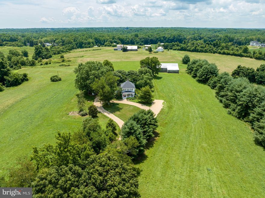 Coming soon...Welcome to your serene escape from the city's hustle and bustle! Nestled on a sprawling 21-acre farmette, this picturesque property offers the perfect blend of historic charm and modern comfort.

Step back in time with the beautifully restored 1925 farmhouse, boasting roughly 2700 square feet of inviting living space. From the moment you arrive, you'll be enchanted by the tranquil surroundings and lush pastureland that surrounds the property.

With its prime location spanning three separate lots, each with its own address, this oasis offers endless possibilities. Whether you're dreaming of a hobby farm, equestrian paradise, or simply seeking a peaceful retreat, this property has it all.

The main residence features four bedrooms, including a convenient main level primary bedroom, providing ample space for family and guests. Meticulously restored in the mid-90s, the farmhouse exudes character and charm at every turn.

Outside, two barns and a workshop offer plenty of space for storage, hobbies, creating stables or many other potential projects. The mostly open pasture-land provides a blank canvas for your agricultural aspirations or outdoor activities.

For those seeking additional investment opportunities, the two extra lots have passed perc tests in the past, though renewal may be required.

Don't miss your chance to own this spectacular piece of paradise. Escape to tranquility and discover the endless possibilities that await at Childs' Return.